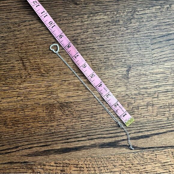 Faux diamond heart pendant sparkle necklace on a silver tone chain - Picture 5 of 5